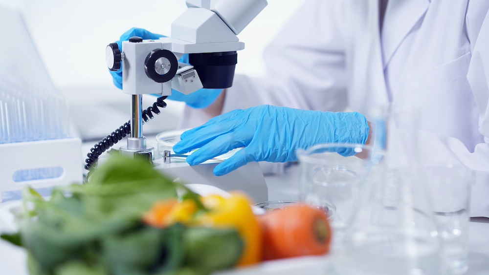A scientist working with food as an important step to in CPG product innovation